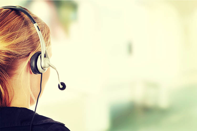 girl on the phone getting in touch with customers