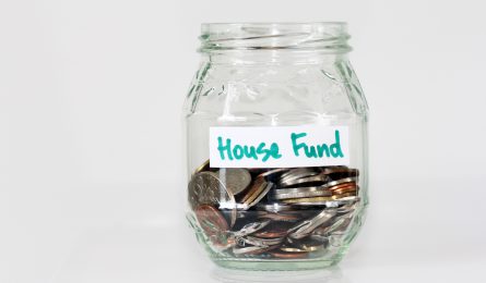 house fund savings in glass jar showing isa allowance for 2021/22
