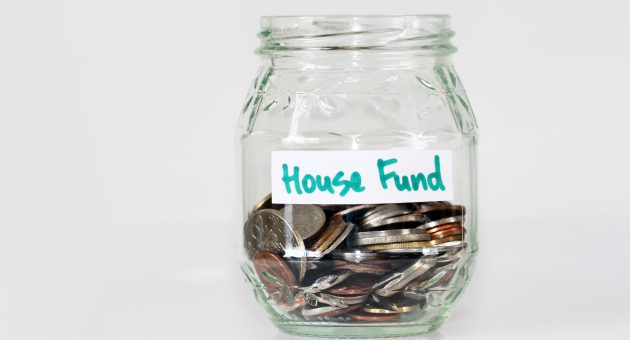 house fund savings in glass jar showing isa allowance for 2021/22