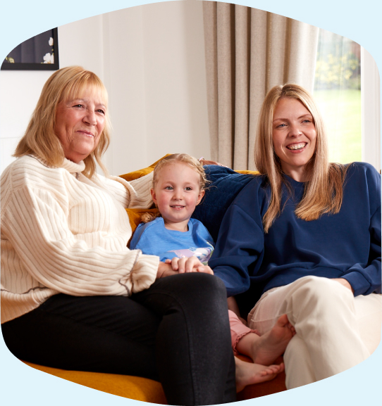 Family with child on couch at home