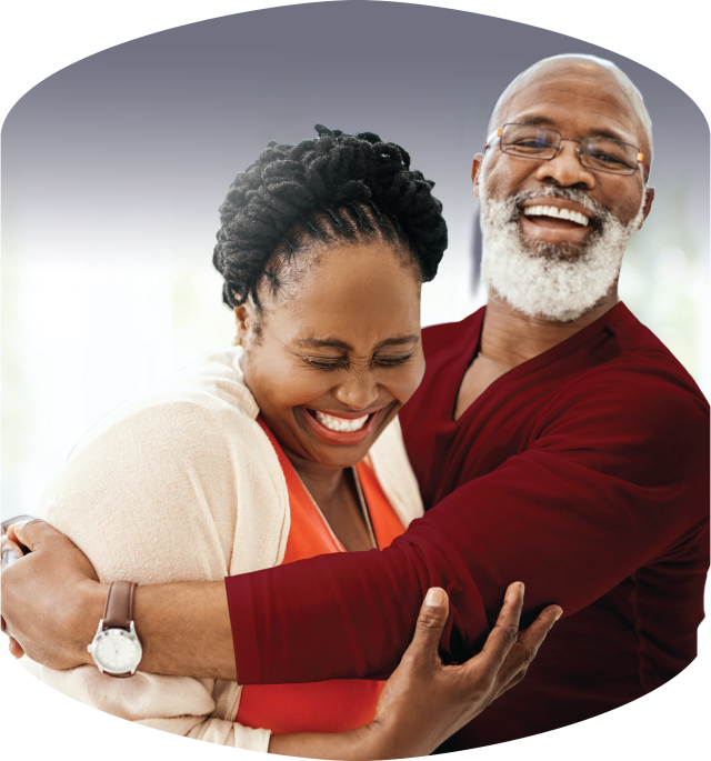 Happy looking middle aged man and woman